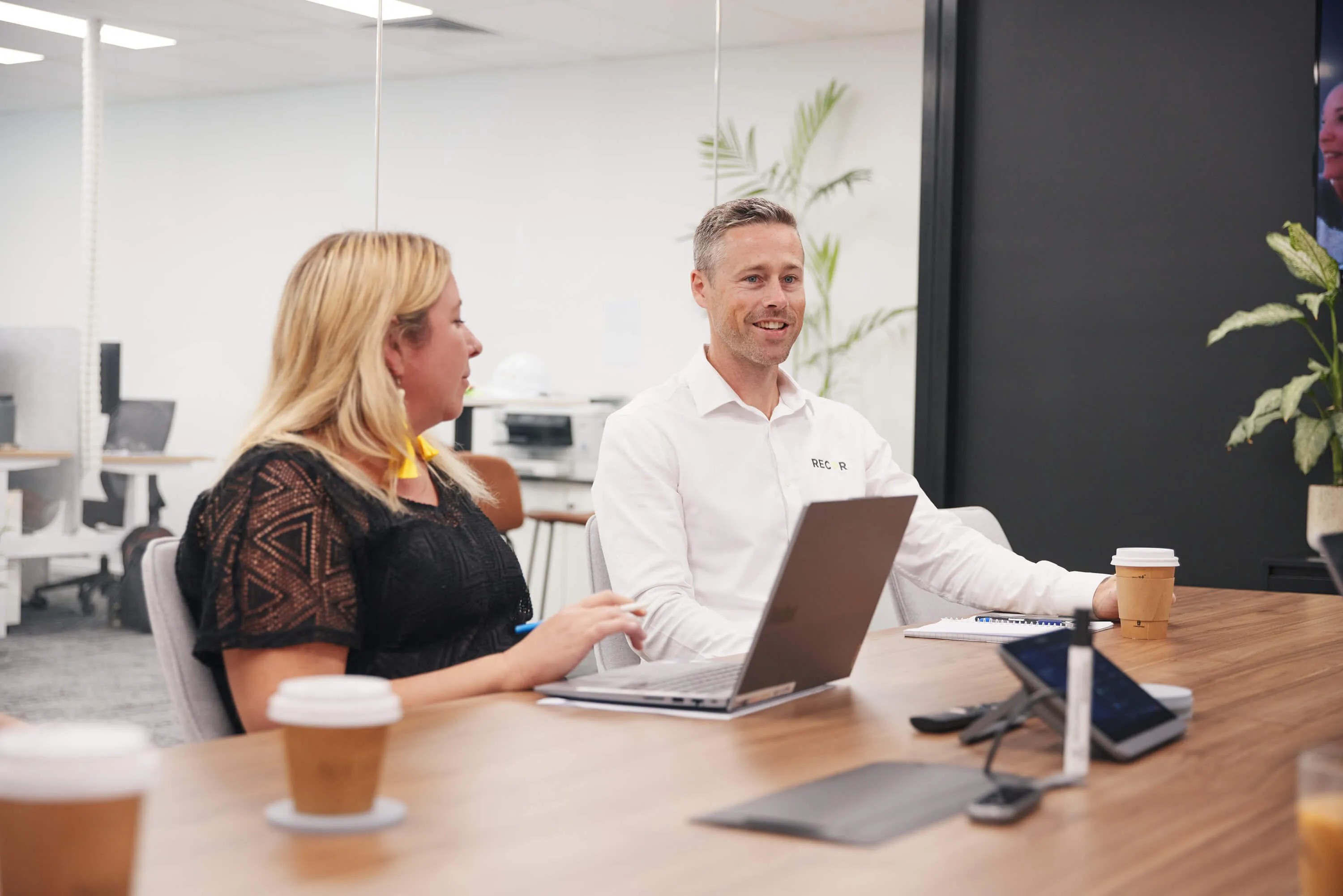 Two people working in an office